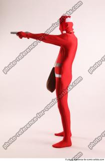 JOEL_ADAMSON CHRISTMAS VILLAIN WITH TWO GUNS